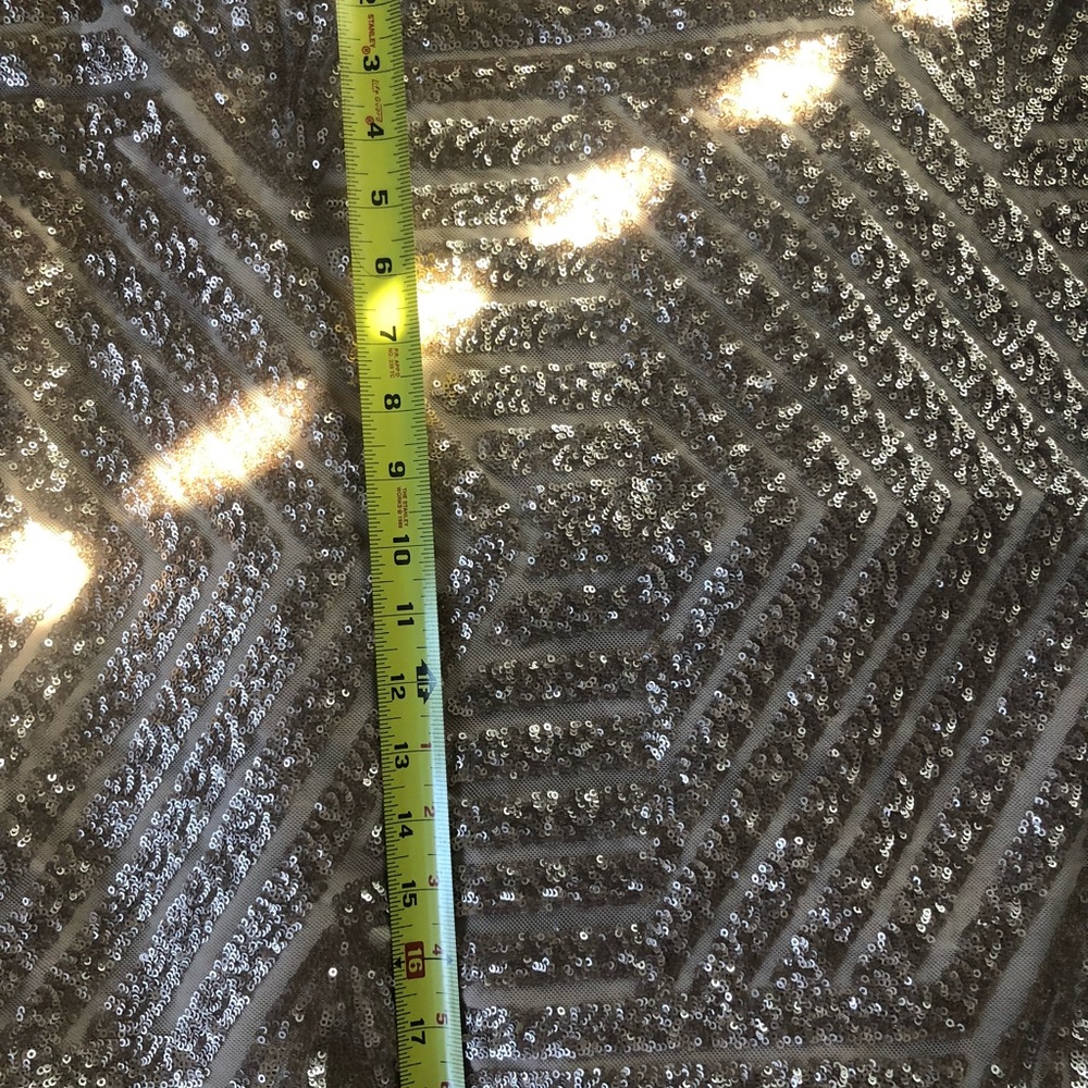 Gold sequence cocktail dress.  Very flattering